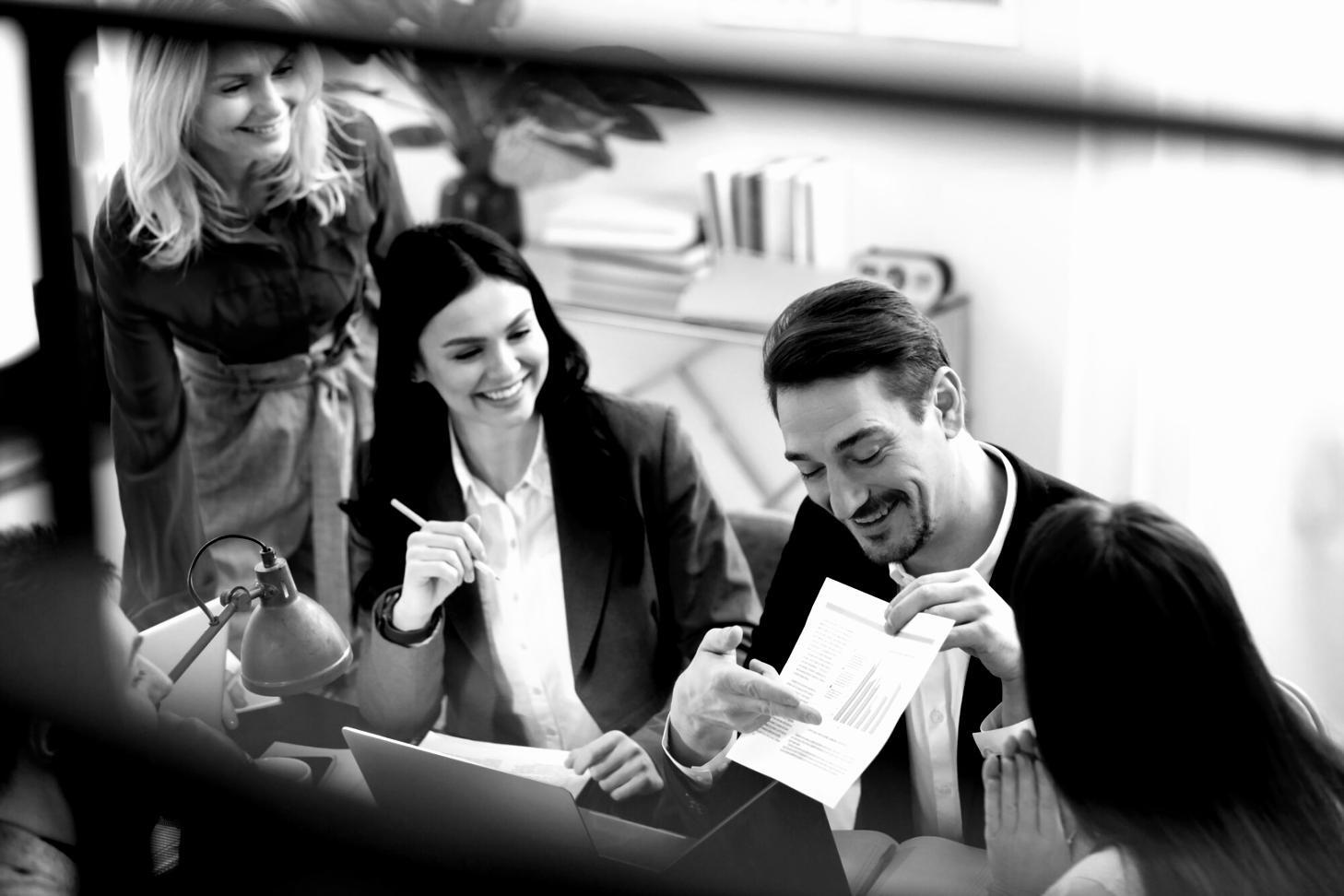 Student analysing company financial documents with detailed annotations